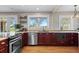 Updated kitchen with granite countertops and stainless steel appliances at 2601 N Clayton St, Denver, CO 80205