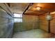 Rustic horse stall interior with wood walls, bright lighting and ample space, ready for equine residents at 10381 Hondah Dr, Littleton, CO 80127