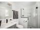 Modern bathroom featuring a walk-in shower and sleek fixtures at 9561 W Wesley Dr, Lakewood, CO 80227