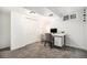 Office and bedroom with a desk and storage creating a functional workspace at 9561 W Wesley Dr, Lakewood, CO 80227