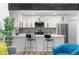 Modern kitchen featuring a breakfast bar, sleek white cabinetry, and stainless steel appliances at 12172 Bannock Cir # B, Denver, CO 80234