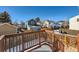 View from back deck showing a yard, neighboring houses, and a wooden fence at 137 S Bedford Ave, Castle Rock, CO 80104