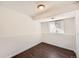 Simple bedroom with dark wood floors and a window at 137 S Bedford Ave, Castle Rock, CO 80104