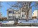 Two-story house with a front yard, steps, and snowy landscaping at 137 S Bedford Ave, Castle Rock, CO 80104