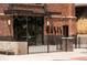 Exterior view of the Oasis Brewery with brick and black trim at 3425 W Moncrieff Pl, Denver, CO 80211