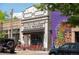 Exterior shot of Mead St. Provisions building with a colorful mural on the side at 3425 W Moncrieff Pl, Denver, CO 80211