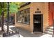 Exterior view of Kate Maller Jewelry, a brick building in Highland Square at 3425 W Moncrieff Pl, Denver, CO 80211