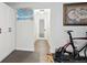 Home gym and office with exercise bike at 2262 Ammons St, Lakewood, CO 80214