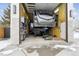 Oversized garage with high ceilings, RV parking, and ample storage space at 2262 Ammons St, Lakewood, CO 80214