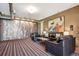 Stylish lobby area with leather seating, textured walls, and modern lighting, creating a welcoming atmosphere at 10111 Inverness Main St # 230, Englewood, CO 80112