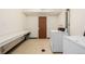 Shared laundry room with coin-operated washer and dryer at 310 S Ames St # 11, Lakewood, CO 80226