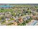 Aerial view of the property showcasing its location near a lake, open fields, and neighborhood amenities at 6527 S Yarrow Way, Littleton, CO 80123