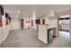 Finished basement with a bar area, providing extra living and entertainment space at 6527 S Yarrow Way, Littleton, CO 80123