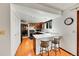 Modern kitchen bar and island offer extra space for casual dining and meal preparation at 6527 S Yarrow Way, Littleton, CO 80123
