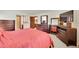 Comfortable primary bedroom suite with ensuite bathroom and ample closet space at 6527 S Yarrow Way, Littleton, CO 80123