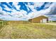 Exterior view of barn featuring a metal roof and wide open spaces at 73 N Dutch Valley Rd, Bennett, CO 80102
