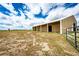 Exterior of barn and fenced pasture, perfect for livestock at 73 N Dutch Valley Rd, Bennett, CO 80102