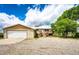 Charming home featuring an attached garage and inviting wood deck at 73 N Dutch Valley Rd, Bennett, CO 80102