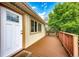 Welcoming front deck with stylish railings and a charming entrance at 73 N Dutch Valley Rd, Bennett, CO 80102