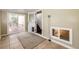 Mud room with sliding glass doors to the deck, stairs to the main floor and a bathroom window at 73 N Dutch Valley Rd, Bennett, CO 80102