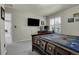 This comfortable bedroom features a desk area, a window, and a quilt-covered bed at 2742 S Braun Way, Lakewood, CO 80228