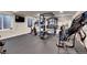 Home gym is equipped with weights, exercise equipment, and mirrored walls at 2742 S Braun Way, Lakewood, CO 80228