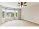 Bedroom with carpet, natural light from large windows overlooking the front yard at 6043 S Paris St, Greenwood Village, CO 80111