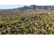 Picturesque aerial view of the neighborhood with lush trees and mountain views at 2235 Edgewood Dr, Boulder, CO 80304