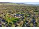 Wonderful aerial of the neighborhood and school, all surrounded by trees and greenery at 2235 Edgewood Dr, Boulder, CO 80304