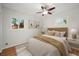 Cozy bedroom with natural light, hardwood floors and a ceiling fan at 2235 Edgewood Dr, Boulder, CO 80304