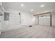 Well lit garage features door, storage and carpet to keep your car clean and safe at 2235 Edgewood Dr, Boulder, CO 80304