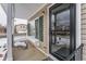 Front porch detail with black door and green shutters at 19696 E 50Th Ave, Denver, CO 80249