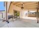 Covered back patio perfect for outdoor dining and relaxation at 3870 S Ouray Way, Aurora, CO 80013