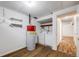 Laundry area includes washer, dryer and laminate flooring at 3870 S Ouray Way, Aurora, CO 80013