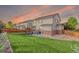 Expansive backyard with fenced perimeter and private patio area at 129 N Irvington St, Aurora, CO 80018