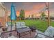 Backyard patio with comfortable seating, perfect for outdoor relaxation at 129 N Irvington St, Aurora, CO 80018