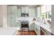 Well-equipped kitchen boasting modern appliances and ample cabinet space at 129 N Irvington St, Aurora, CO 80018