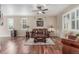 Spacious living room with hardwood floors and abundant natural light at 129 N Irvington St, Aurora, CO 80018