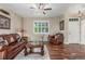 Inviting living room with hardwood floors, plantation shutters and nice decor at 129 N Irvington St, Aurora, CO 80018