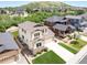 Charming two-story home with a manicured front lawn and an attached two-car garage in a suburban setting at 3834 Donnington Cir, Castle Rock, CO 80104