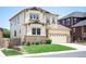 Charming two-story home with a well-maintained lawn and attached two-car garage at 3834 Donnington Cir, Castle Rock, CO 80104