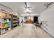 Spacious basement with concrete flooring, ample lighting, and a kitchenette area at 266 S Nome St, Aurora, CO 80012