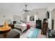 Bedroom features neutral paint, vaulted ceiling, and a ceiling fan at 266 S Nome St, Aurora, CO 80012