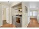 Convenient laundry room with modern appliances and storage space, located just off the hallway at 16750 E Prentice Ave, Centennial, CO 80015