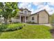 Well maintained two-story home with mature front yard, lush lawn and inviting curb appeal at 154 Falcon Cir, Mead, CO 80542