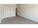 Spacious bedroom with plush carpeting and ample closet space providing a comfortable retreat at 3825 Canyon Ranch Rd # 203, Highlands Ranch, CO 80126