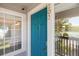 Inviting front door with classic design, window detail, and gold numbering at 3825 Canyon Ranch Rd # 203, Highlands Ranch, CO 80126