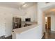 Bright kitchen with stainless steel appliances and ample cabinet space at 3825 Canyon Ranch Rd # 203, Highlands Ranch, CO 80126