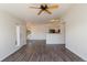 Bright open-concept living space flowing into the dining area and kitchen, great for entertaining at 3825 Canyon Ranch Rd # 203, Highlands Ranch, CO 80126