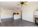Spacious living area seamlessly connecting to a well-equipped kitchen, perfect for modern living at 3825 Canyon Ranch Rd # 203, Highlands Ranch, CO 80126
